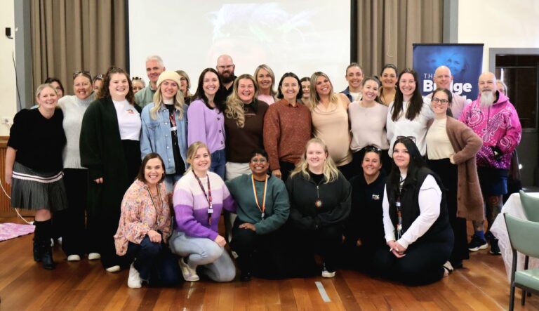 Group of people that includes staff members from TBYS and cultural facilitator, speaker and mentor Nartarsha Bamblett.